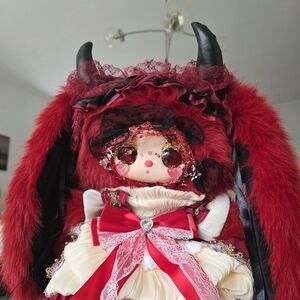 Elegant Red and Cream Fantasy Doll